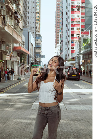 Asian Woman Smiling on Kennedy Town Street Hong Kong Asian Woman Smiling on Kennedy Town Street Hong Kong 138204526