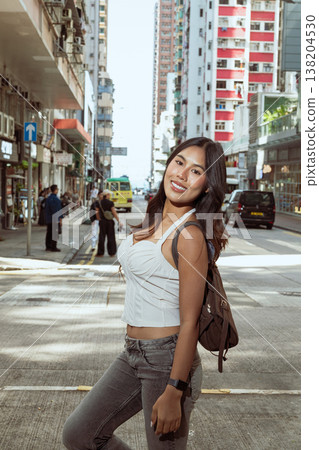 Asian Woman Smiling on Kennedy Town Street Hong Kong Asian Woman Smiling on Kennedy Town Street Hong Kong 138204530