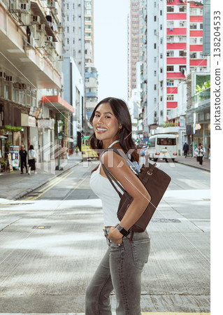 Asian Woman Smiling on Kennedy Town Street Hong Kong 138204533