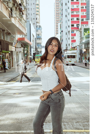 Asian Woman Smiling on Kennedy Town Street Hong Kong Asian Woman Smiling on Kennedy Town Street Hong Kong 138204537