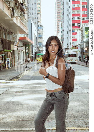 Asian Woman Smiling on Kennedy Town Street Hong Kong Asian Woman Smiling on Kennedy Town Street Hong Kong 138204540