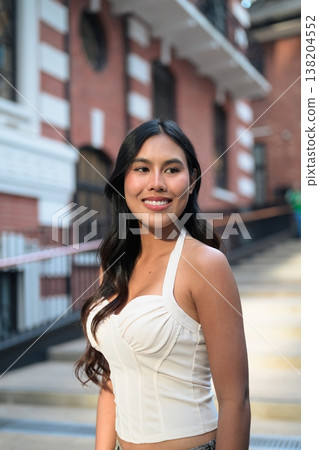 Asian Woman Smiling at Tai Kwun Hong Kong Asian Woman Smiling at Tai Kwun Hong Kong 138204552