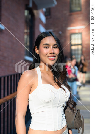 Asian Woman Smiling at Tai Kwun Hong Kong 138204563