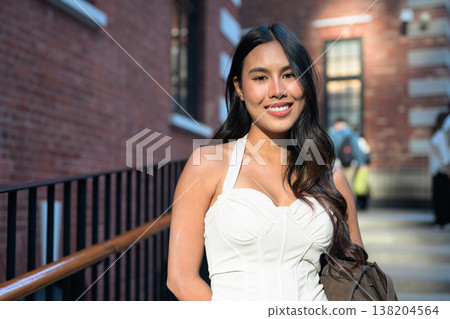 Asian Woman Smiling at Tai Kwun Hong Kong 138204564