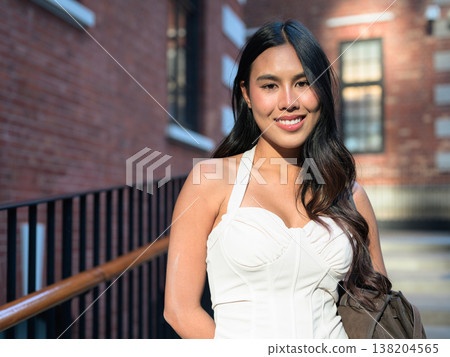 Asian Woman Smiling at Tai Kwun Hong Kong 138204565
