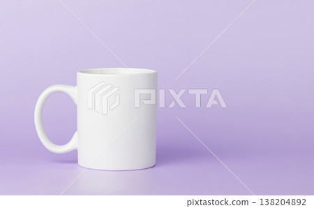 white cup for tea or coffee on a violet, purple background white cup for tea or coffee on a violet, purple background 138204892