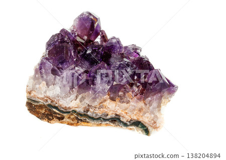 Amethyst Crystal Druse macro mineral on white background Amethyst Crystal Druse macro mineral on white background 138204894
