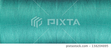 texture of threads for a sewing machine blue colors on a white background texture of threads for a sewing machine blue colors on a white background 138204895