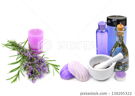 Lavender spa and aromatherapy set with purple candles, essential oils, handmade soap, and fresh flowers isolated on a white background, horizontal orientation, relaxation and wellness concept. 138205322