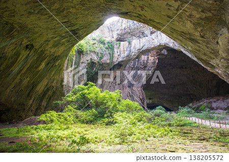Inner Cavern of Devetashka Cave with Lush Green Growth Inner Cavern of Devetashka Cave with Lush Green Growth 138205572