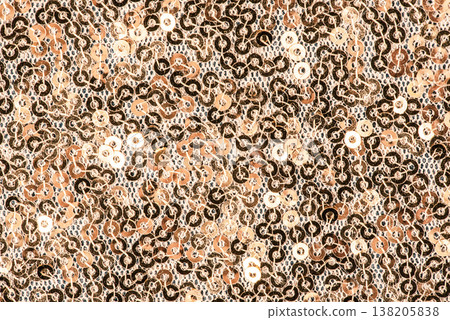 Brown sequins on fabric macro photo as a background. 138205838