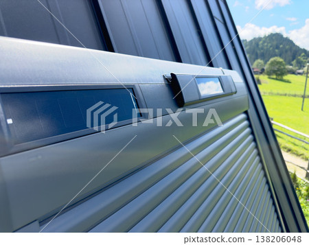 Autonomous roof window control system powered by solar energy. Smart roller shutters. 138206048
