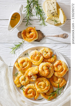 Sarikopita, spiral cheese phyllo pastries on plate 138206572