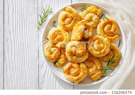 Sarikopita, spiral cheese phyllo pastries on plate Sarikopita, spiral cheese phyllo pastries on plate 138206574