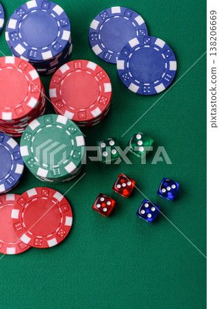 Multicolored casino chips as a conceptual backdrop for gambling games. Multicolored casino chips 138206669