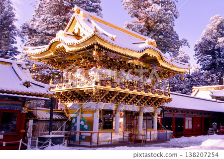 Nikko City, Nikko Toshogu Shrine, Yomeimon Gate covered in snow, shining in the morning sun. Nikko City, Nikko Toshogu Shrine, Yomeimon Gate covered in snow, shining in the morning sun. 138207254