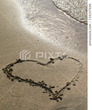 Heart drawn on the beach sand Heart drawn on the beach sand 138207686