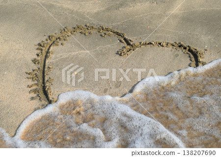 Heart drawn on the beach sand Heart drawn on the beach sand 138207690