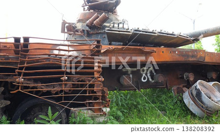 Rusty and burned-out armored vehicles on ukrainian territory. Exhibition of destroyed military equipment of the russian army. War between Ukraine and russia. Close up Slow motion 138208392