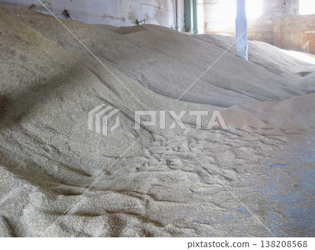 Heap of grains of barley and wheat in stock Heap of grains of barley and wheat in stock 138208568