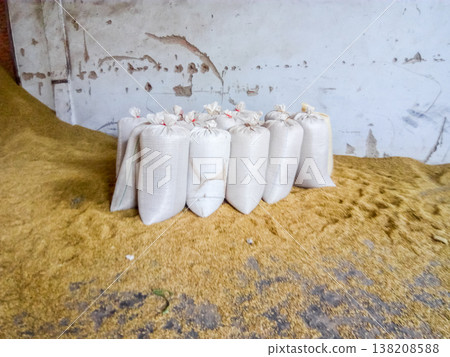 Heap of grains of barley and wheat in stock Heap of grains of barley and wheat in stock 138208588