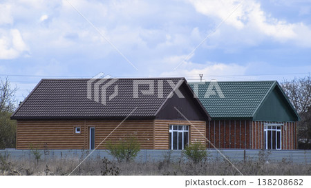 The roof of corrugated sheet on the houses The roof of corrugated sheet on the houses 138208682