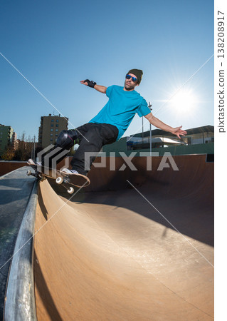 Skateboarder on a grind Skateboarder on a grind 138208917