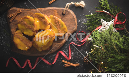 Christmas Rabanadas with egg yolk cream Christmas Rabanadas with egg yolk cream 138209058
