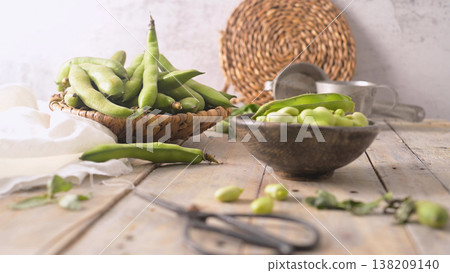 Fresh and raw green broad beans Fresh and raw green broad beans 138209140