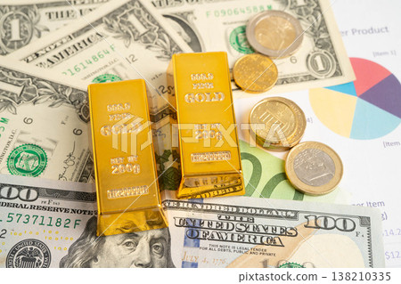 Gold bars with US dollar and Euro banknote money, finance trading investment business currency. 138210335