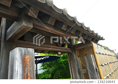 Japanese garden entrance with tiled roof Japanese garden entrance with tiled roof 138210643