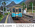 A local train stopped at Kaminada Station. 138211254