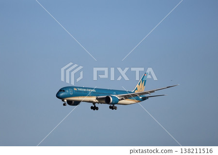 A Vietnam Airlines passenger plane landing at Haneda Airport A Vietnam Airlines passenger plane landing at Haneda Airport 138211516