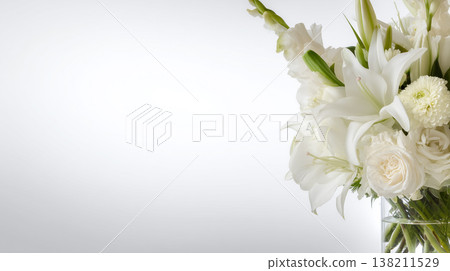 A bouquet of white flowers, positioned to the right, against a white background, close-up, in natural light. 138211529