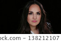 Empowerment and Confidence Portrait of a Young Woman With a Determined Expression Against a Dark 138212107