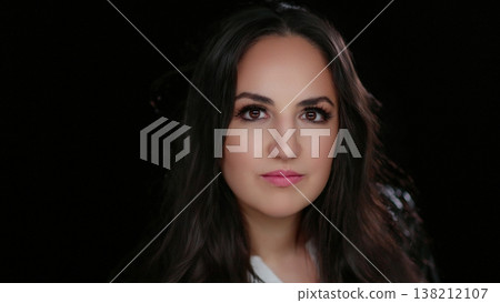 Empowerment and Confidence Portrait of a Young Woman With a Determined Expression Against a Dark Empowerment and Confidence Portrait of a Young Woman With a Determined Expression Against a Dark 138212107