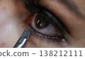Beauty Trends and Self-Care Close-Up of Woman Applying Eyeliner with brush for Makeup Tutorial or 138212111