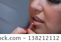 Beauty Trends And Makeup Artistry Close-Up Of Woman Applying Lip Liner For Cosmetic Enhancement And 138212112