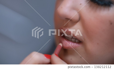 Beauty Trends And Makeup Artistry Close-Up Of Woman Applying Lip Liner For Cosmetic Enhancement And Beauty Trends And Makeup Artistry Close-Up Of Woman Applying Lip Liner For Cosmetic Enhancement And 138212112