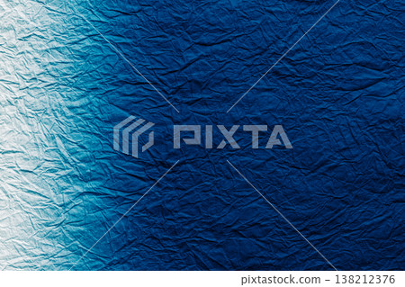 Wrinkled Japanese paper, a gradient of dark blue and white. Wrinkled Japanese paper, a gradient of dark blue and white. 138212376