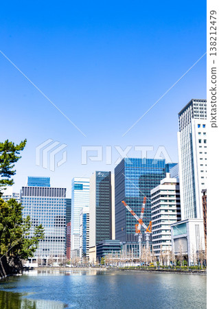 The skyscrapers of Tokyo, the capital city, stand out against the blue sky. The skyscrapers of Tokyo, the capital city, stand out against the blue sky. 138212479