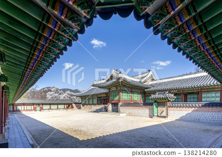 Traditional Korean Architecture Framed by Colorful Dancheong Eaves at Gyeongbokgung Palace. Traditional Korean Architecture Framed by Colorful Dancheong Eaves at Gyeongbokgung Palace. 138214280