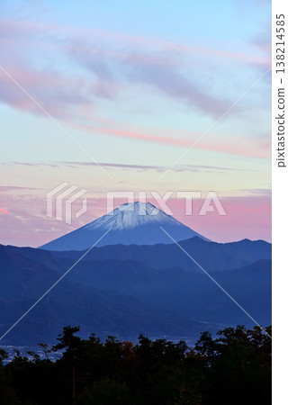 At dusk, Mount Fuji can be seen across the Kofu Basin. At dusk, Mount Fuji can be seen across the Kofu Basin. 138214585