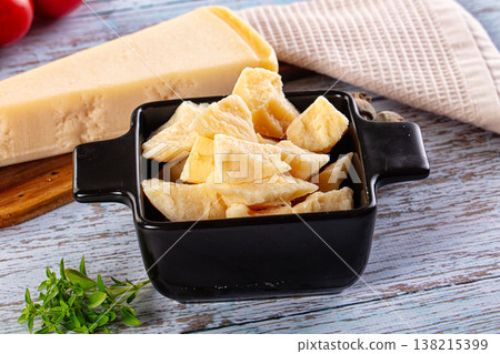 Parmesan cheese pieces in the bowl Parmesan cheese pieces in the bowl 138215399