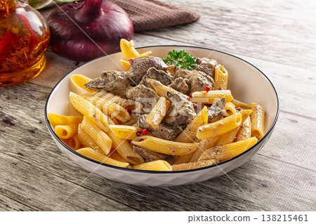 Italian pasta penne with chicken liver Italian pasta penne with chicken liver 138215461