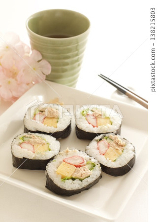Thick sushi rolls and tea Thick sushi rolls and tea 138215803