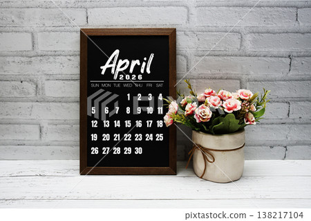 April 2026 monthly calendar on chalkboard for planning and management 138217104