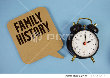 Family History text with alarm clock on blue background 138217150