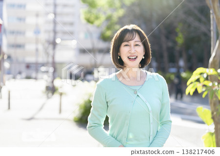 A woman in her 50s smiling at the camera 138217406