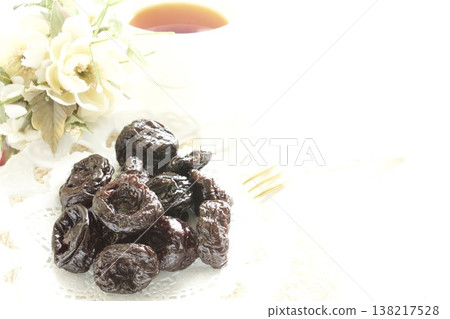 Dried prunes and black tea Dried prunes and black tea 138217528